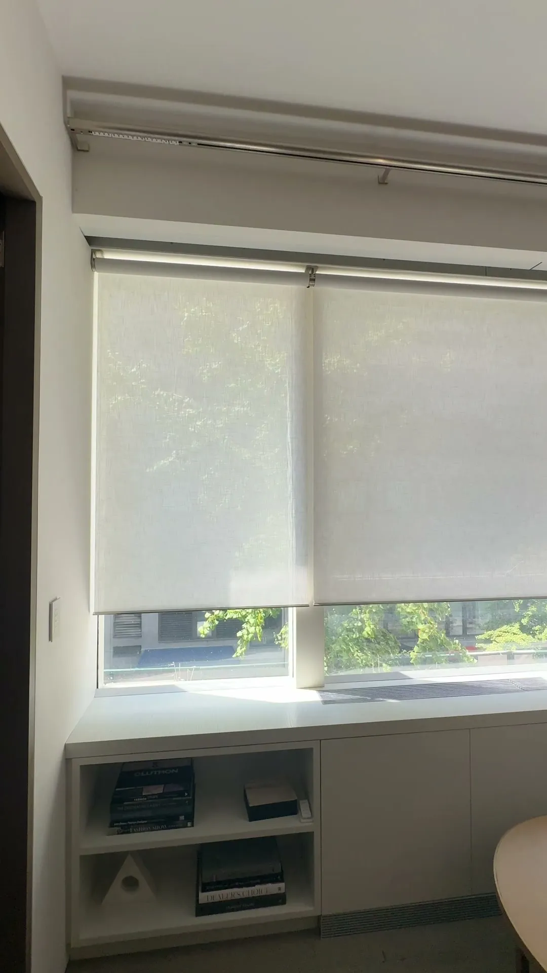 Light-filtering roller shades on corner windows