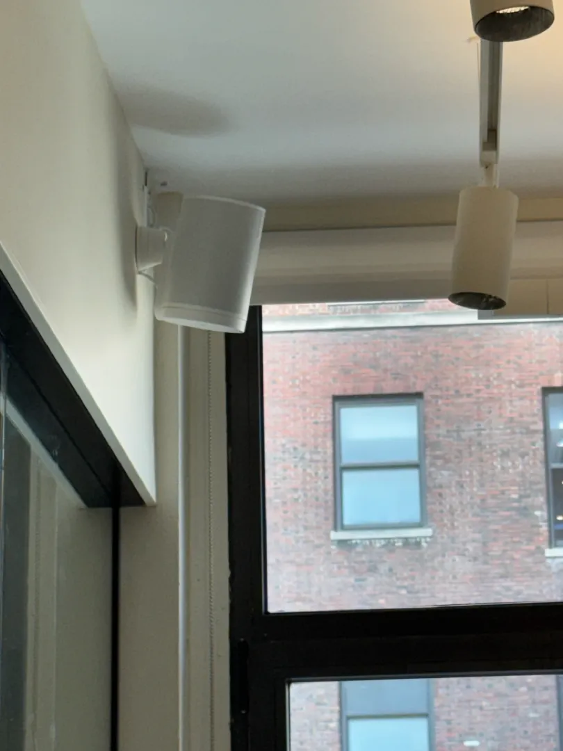 Six Sonos Era 100 Speakers Mounted High Around a Midtown Office — a job in Manhattan