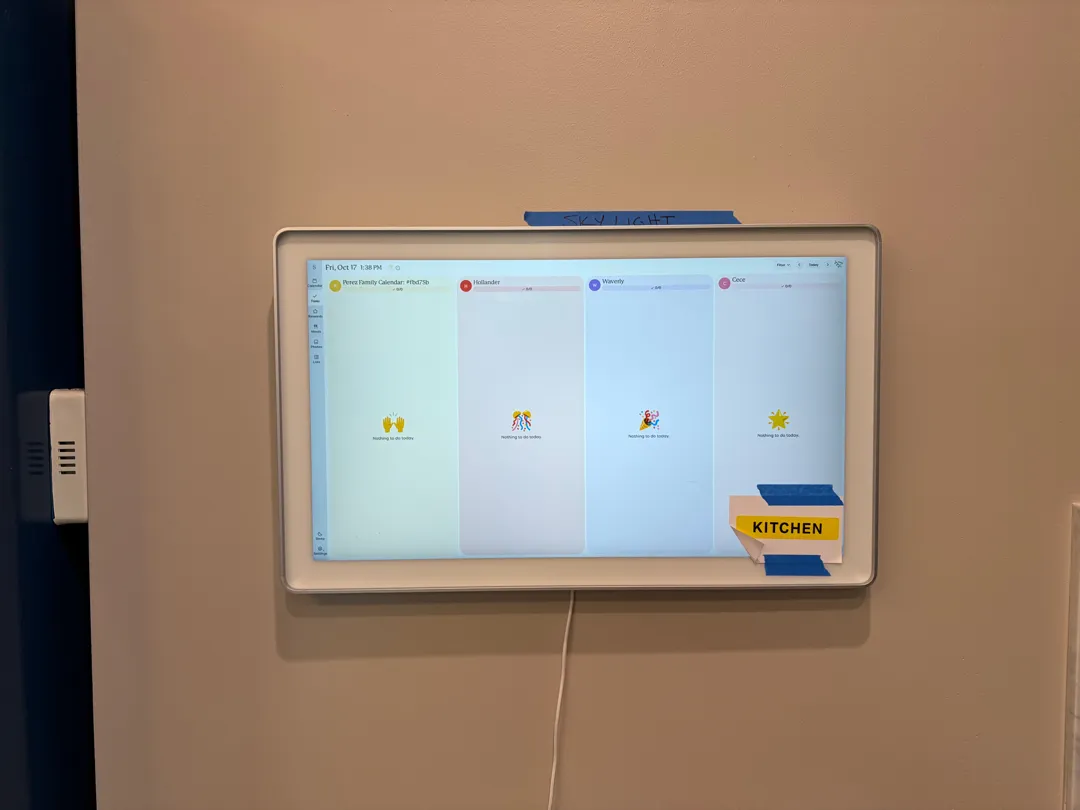 A wall-mounted family calendar display, matching the calendar remounting work.