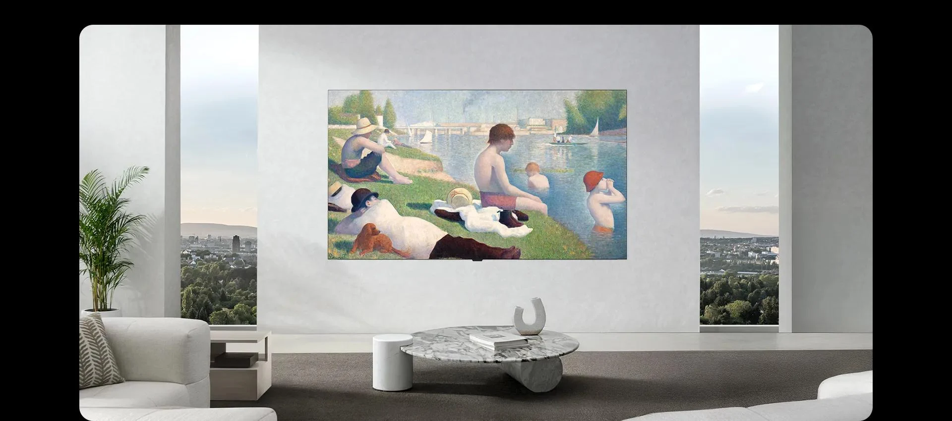 LG OLED W6 mounted flush on a bright living room wall with no visible cables, displaying a pointillist beach painting above a low sofa and marble coffee table
