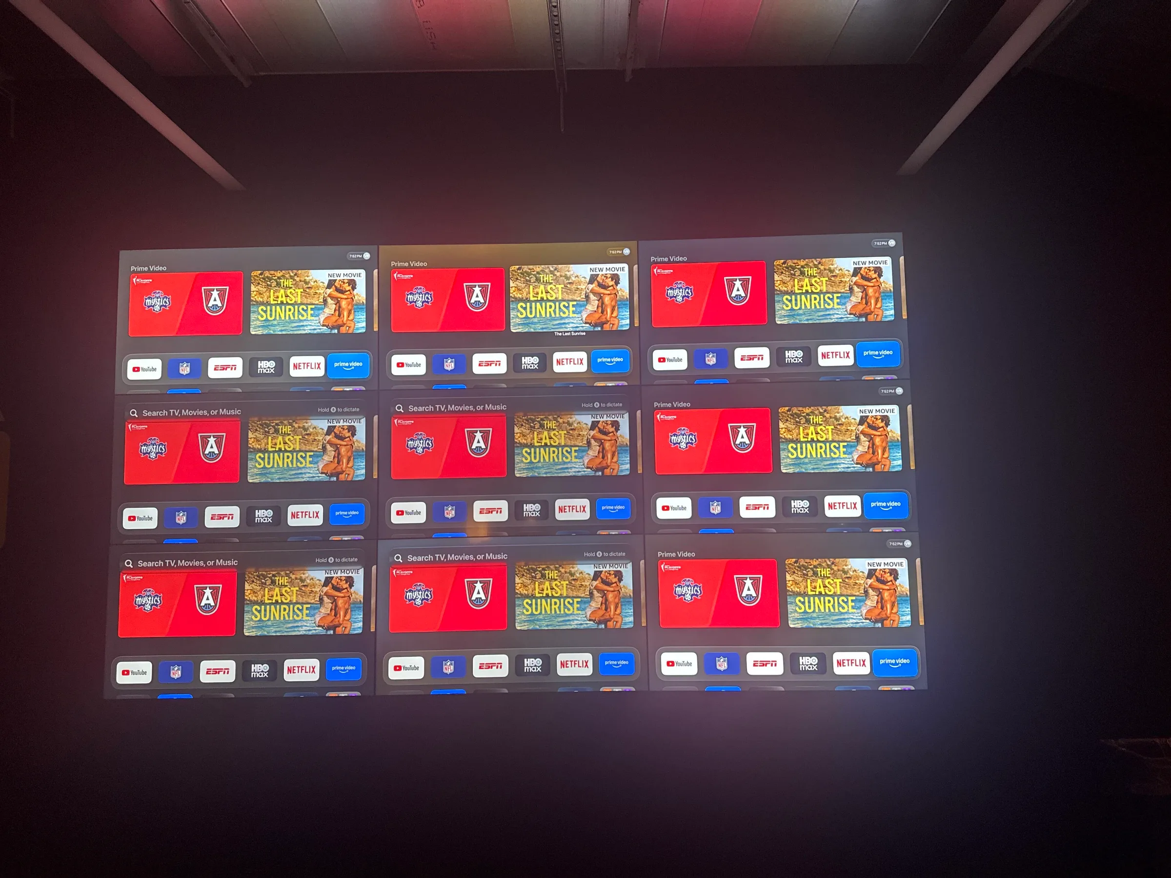 Straight-on view of a finished nine-screen Video Wall in a Brooklyn office