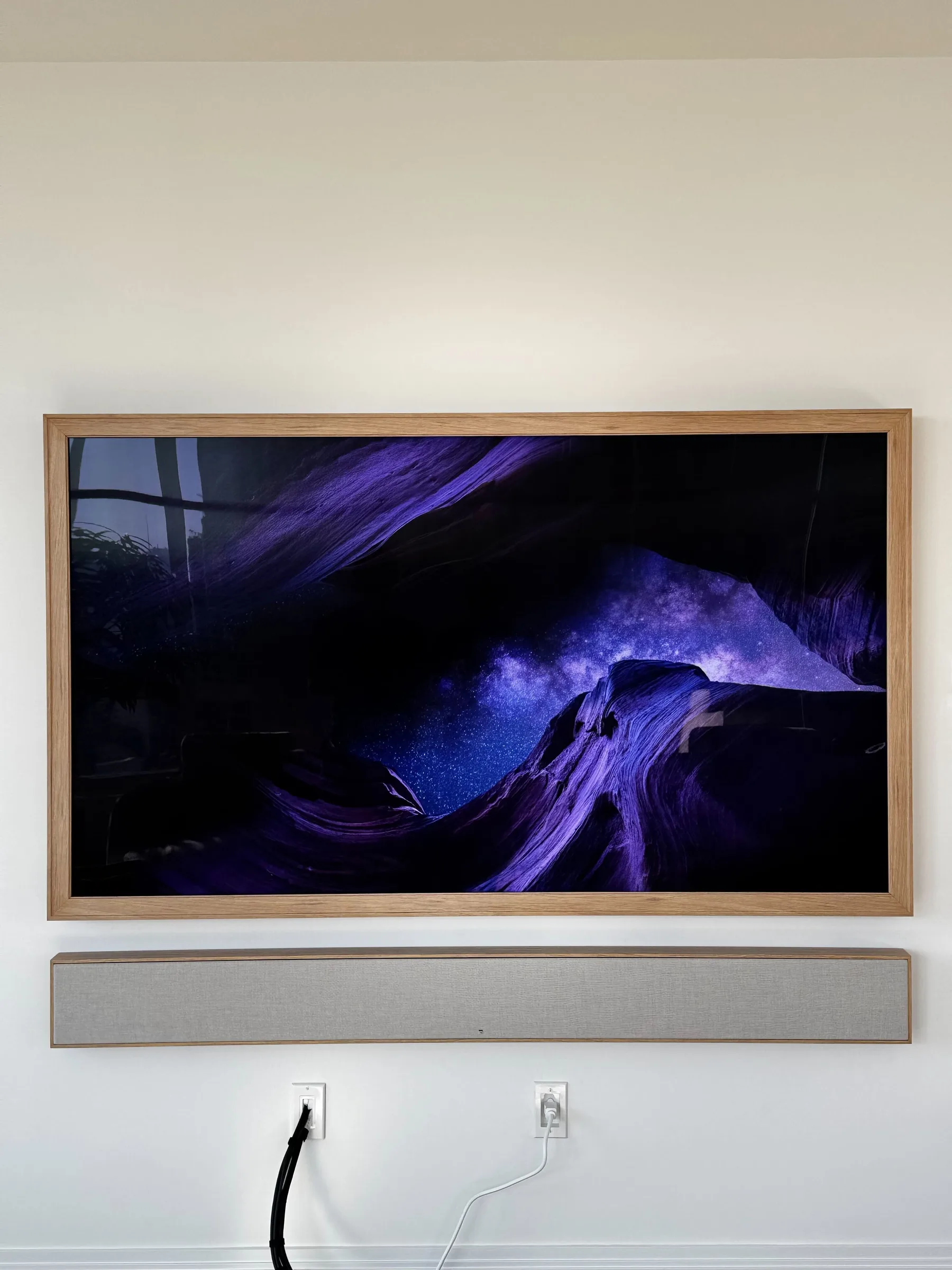 A Leon Oak-Framed TV and Matching Soundbar in a Manhattan High-Rise — a job in Manhattan